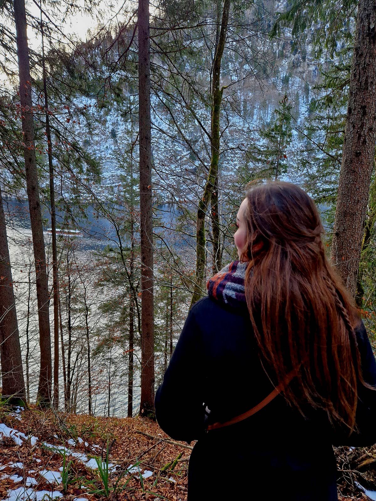 Earth Child looking over the winter lake